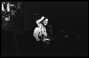 Robert L. Jones performing on stage at the closing of Club 47