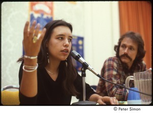 MUSE concert and rally: Winona LaDuke answering a question at a press conference while Jesse Colin Young looks on