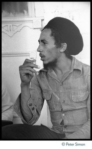 Bob Marley: half-length portrait seated