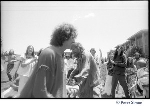 Peter Simon (left) and Bhagavan Das dancing energetically at Sonoma State University