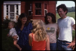Judy Diamond with baby Crescent, Janice Frey, Nina Keller, and Dan Keller in front of the house , Montague Farm Commune