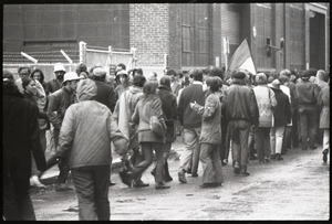 MIT I-Lab demonstration: protesters, one waving North Vietnamese flag