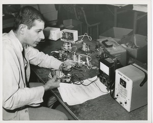 Man testing electrical work