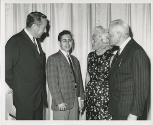 H. Wisner Miller, Jr., Margaret Milbank Bogert and Hermann G. Place with young client at Institute Day