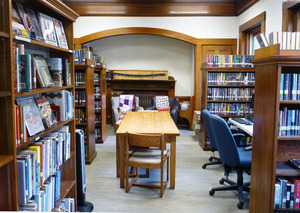 Tyler Memorial Library: interior view with tables and book stacks
