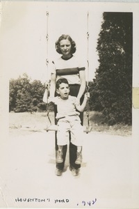 Bernice Kahn with son, Paul, on swing at Houghton's Pond