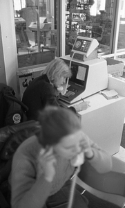 Unidentified call center workers in Boston Police Dispatch Operations Center