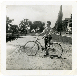 Hermenegildo Silva outside, with bicycle