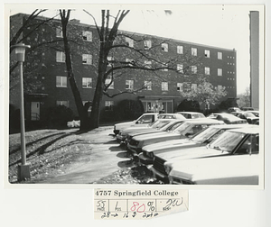 Cars parked in front of Reed Hall