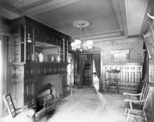 Interior view of unidentified house, room with fireplace and mantel mirror, Longwood, Brookline, Mass., 1888-1892
