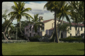 Palm Beach (Large stucco residence among palm trees)