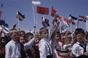 Children waving flags at Tito's birthday celebration in Skopje