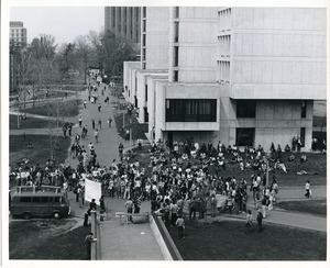 Board of Trustees fee increase demonstration: protesters gathered in front of the Whitmore Administration Building, Herter Hall in background