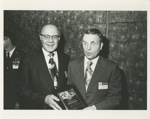 Dr. Salvatore G. DiMichael holds the 1971 President's Trophy with recipient Dr. Robert A. Bottenberg