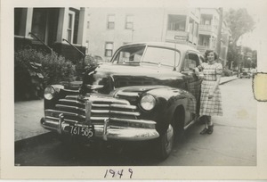 Bernice Kahn posing with car