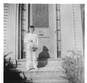 Antonio Leite Loureiro dressed for his First Communion