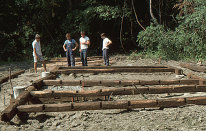 Laying out beams at the Moon Barn Raising Site (4) at entrance to Hopkins Forest on 2 August 1975.