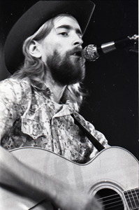 New Riders of the Purple Sage opening for the Grateful Dead at Sargent Gym, Boston University: John 'Marmaduke' Dawson playing acoustic guitar and singing