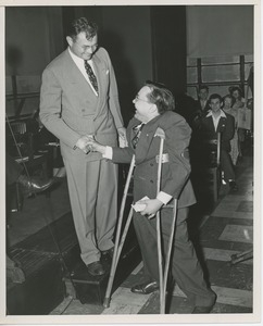 Dr. Knocke handing prize to client at Institute Day