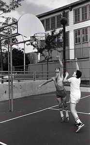 Teenagers playing basketball at Lo Presti Park