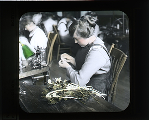 "Stitching hats - The girl in the foreground is making the 'tips'."