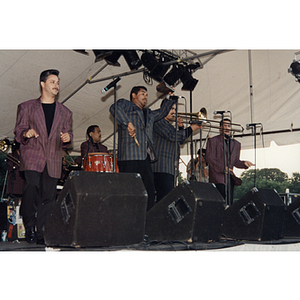 Four band members at the Festival Puertorriqueño