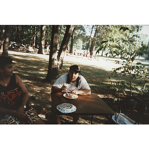 Attendees of an outdoor picnic event