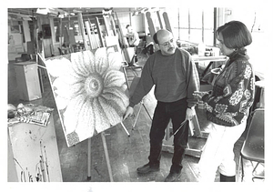 Ronald Maggio and Student looking at flower painting in art classroom