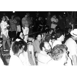 Spectators at a nighttime event at Festival Betances.