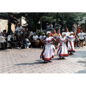 Girls performing a folk dance in the plaza at Festival Betances 1999.
