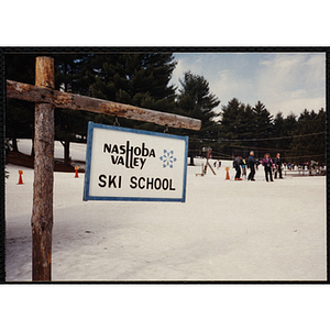 A shot of a "Nashoba Valley Ski School" sign