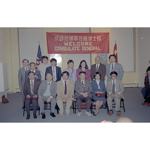 Members from the Consulate General of the People's Republic of China pose for a photograph during a welcome party in Boston