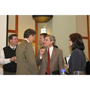 President Freeland converses with people at the Training Future Innovators Entrepreneurs Panel