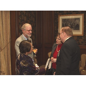 Dr. William Hancock speaks with Barry and Trudy Karger, on right, at the gala dinner honoring John Hatsopoulos