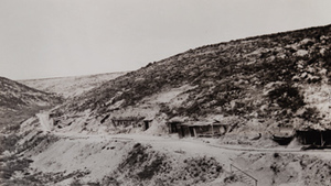 View of six artillery dugouts built into a hillside