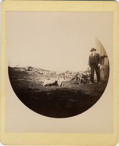 Unidentified man and dogs