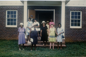 Marjorie Merrill (2d from right) and church members at rebuilt Antioch Church, Blue Mountain, Miss.