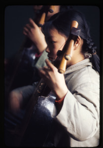Children's Palace -- girl playing instrument