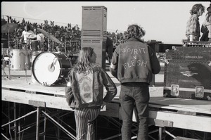 Hollywood Speedway Rock Festival: James Baker and unidentified colleague (l. to r.) at concert stage, both wearing Spirit in Flesh jackets