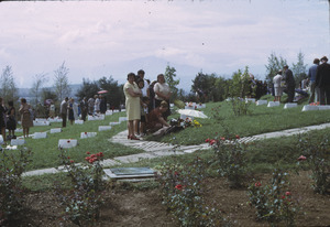 Mourners at graves