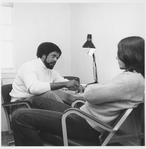 Billy Taylor speaking with a student