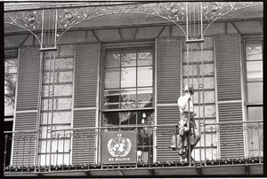 Demonstration at State House against the killings at Kent State: woman on balcony of building at Beacon Street