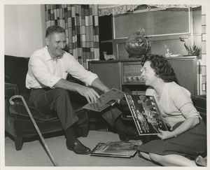 Dick Weir and woman with records