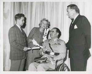 Mrs. Jeremiah Milbank and H. Wisner Miller, Jr. presenting awards to clients on Institute Day