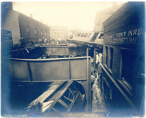 Dudley Street accident, view from tracks of car lodged in building and wreckage on street