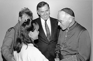 Mayor Raymond L. Flynn, Kathy Flynn, and Bishop Lawrence Riley with unidentified girl