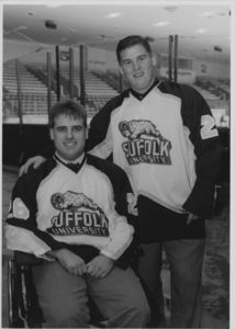 Suffolk University men's hockey player John Gilpatrick and coach Brian Horan, 2000
