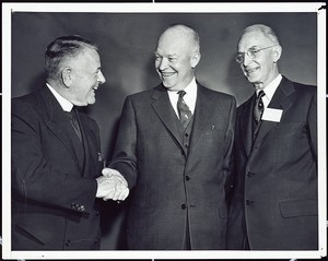 Father Joseph R.N. Maxwell, S.J. at a White House meeting with President Dwight D. Eisenhower, 1955