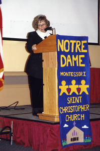 Sister Elizabeth addressing audience at Seeds Planted event