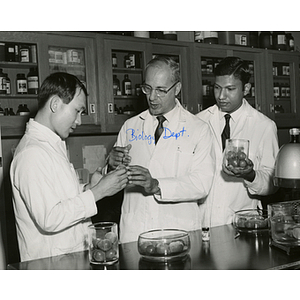 Professor Khudairi and doctoral students in biology lab